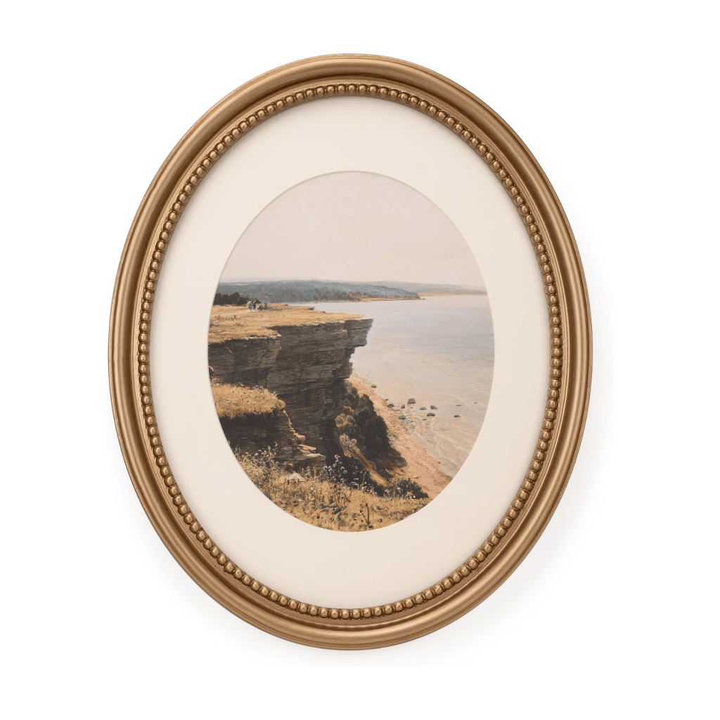 A framed painting depicting a coastal cliff overlooking a calm sea, with grassy terrain and distant hills.