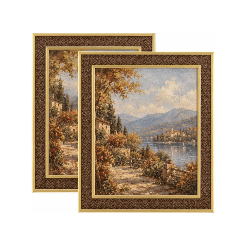 Two framed landscape paintings featuring serene lakeside scenes with mountains in the background and autumn foliage.
