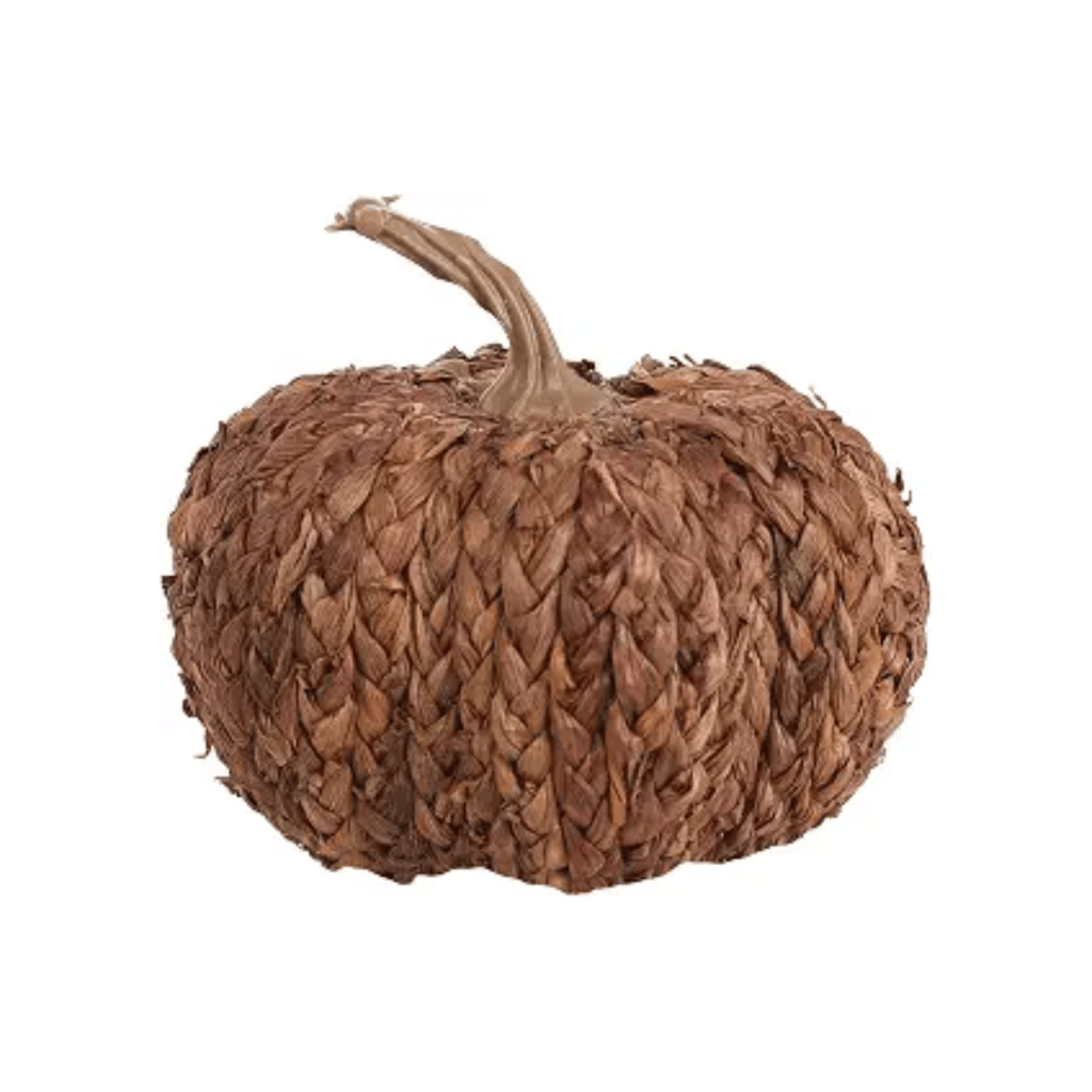 A decorative pumpkin made from woven natural fibers, featuring a stem and a textured surface.
